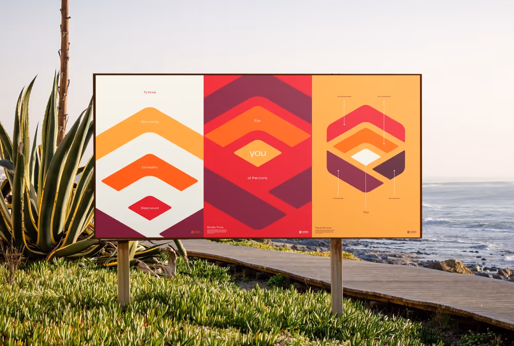 Three posters on an outdoor display.