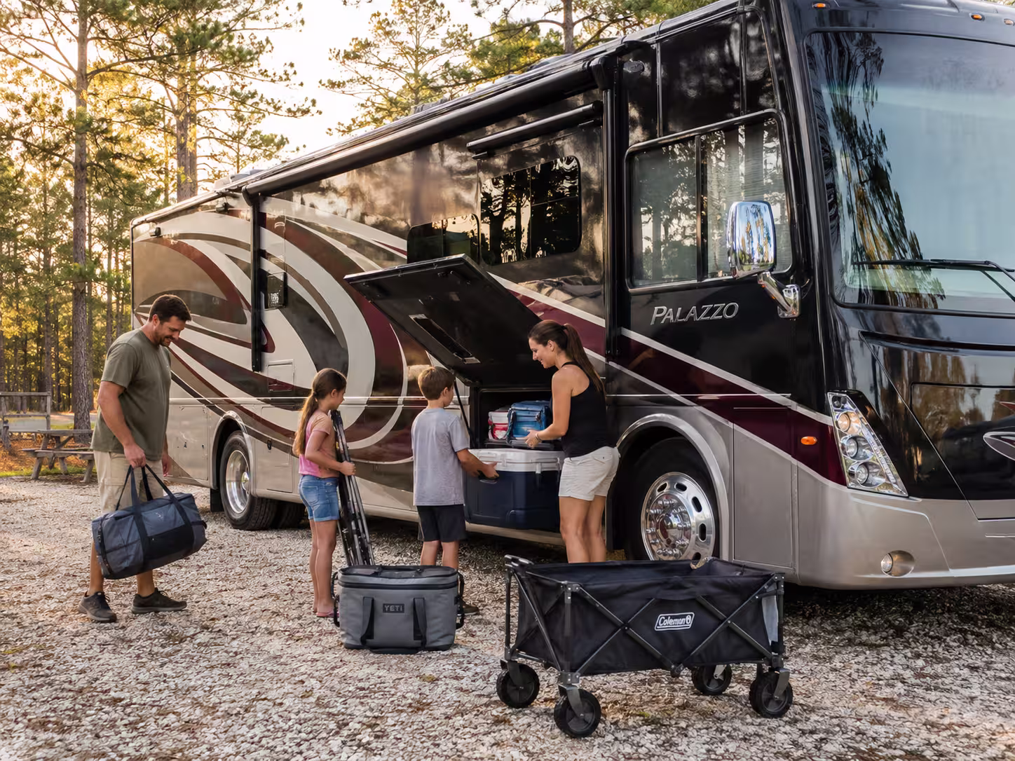 Family loading gear from a luxury RV near Withlacoochee State Forest