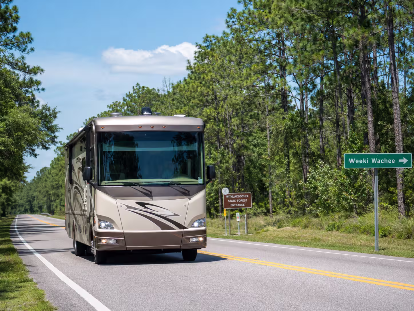 Large RV driving near Withlacoochee State Forest in Brooksville