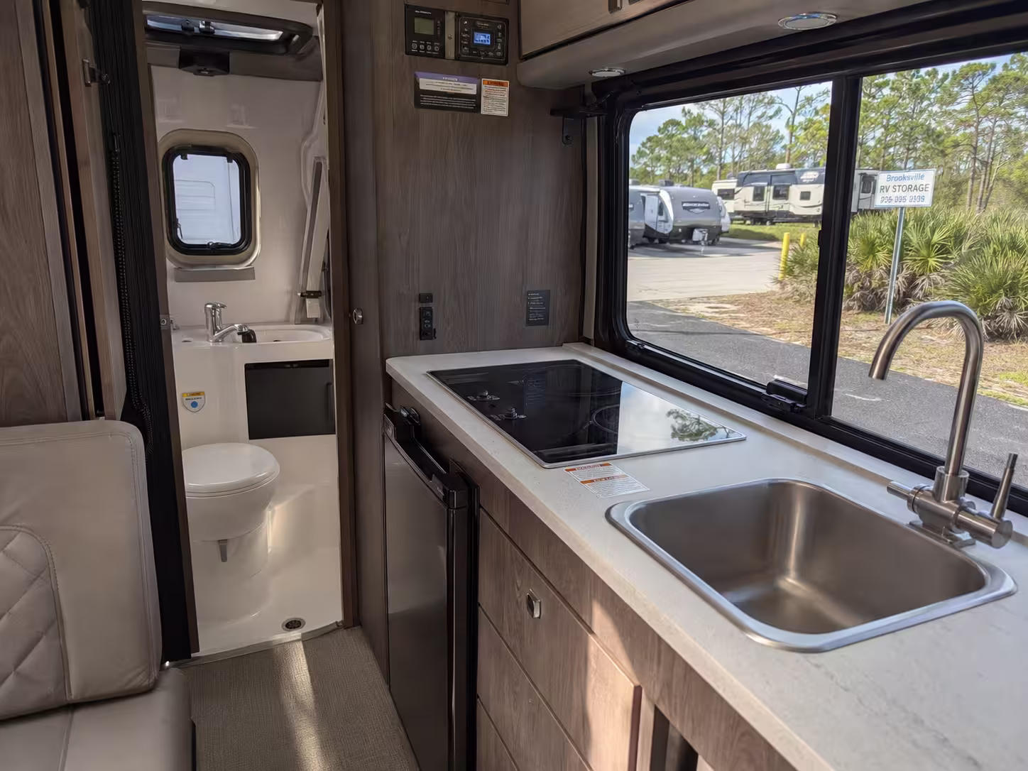 Class B motorhome kitchen and wet bath layout in Brooksville, FL