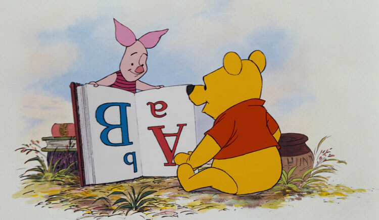 Picture of Winnie the Pooh and Piglet reading a book together