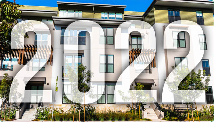 a translucent 2022 overlay over an apartment building