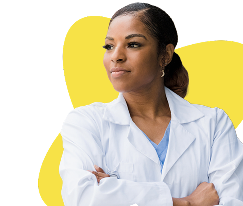 Confident female doctor in white coat with arms crossed standing against a yellow abstract background.