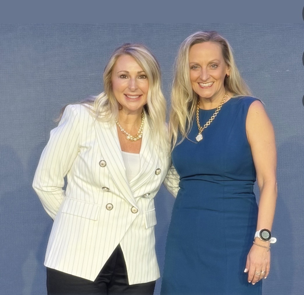 Kari Neidigh (Komodo Health) and Lisa Gurry (GeneDx) posing together at Komodo Summit 2026.