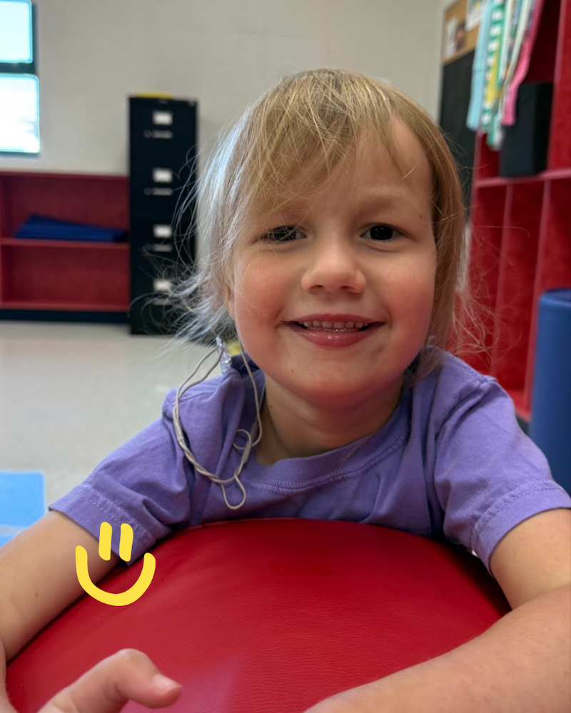 Rosie smiling- how genetic testing defined her journey beyond cerebral palsy.