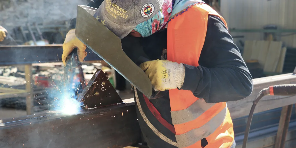 Sparks flying from welders work