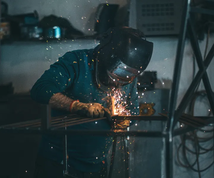 Welder working on metal