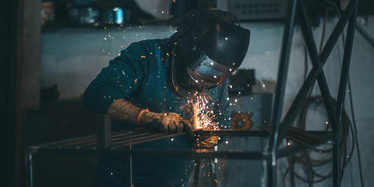 Welder working on metal