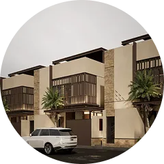 Modern multi-story residential buildings with large windows and balconies, palm trees, and a white SUV parked on the street.