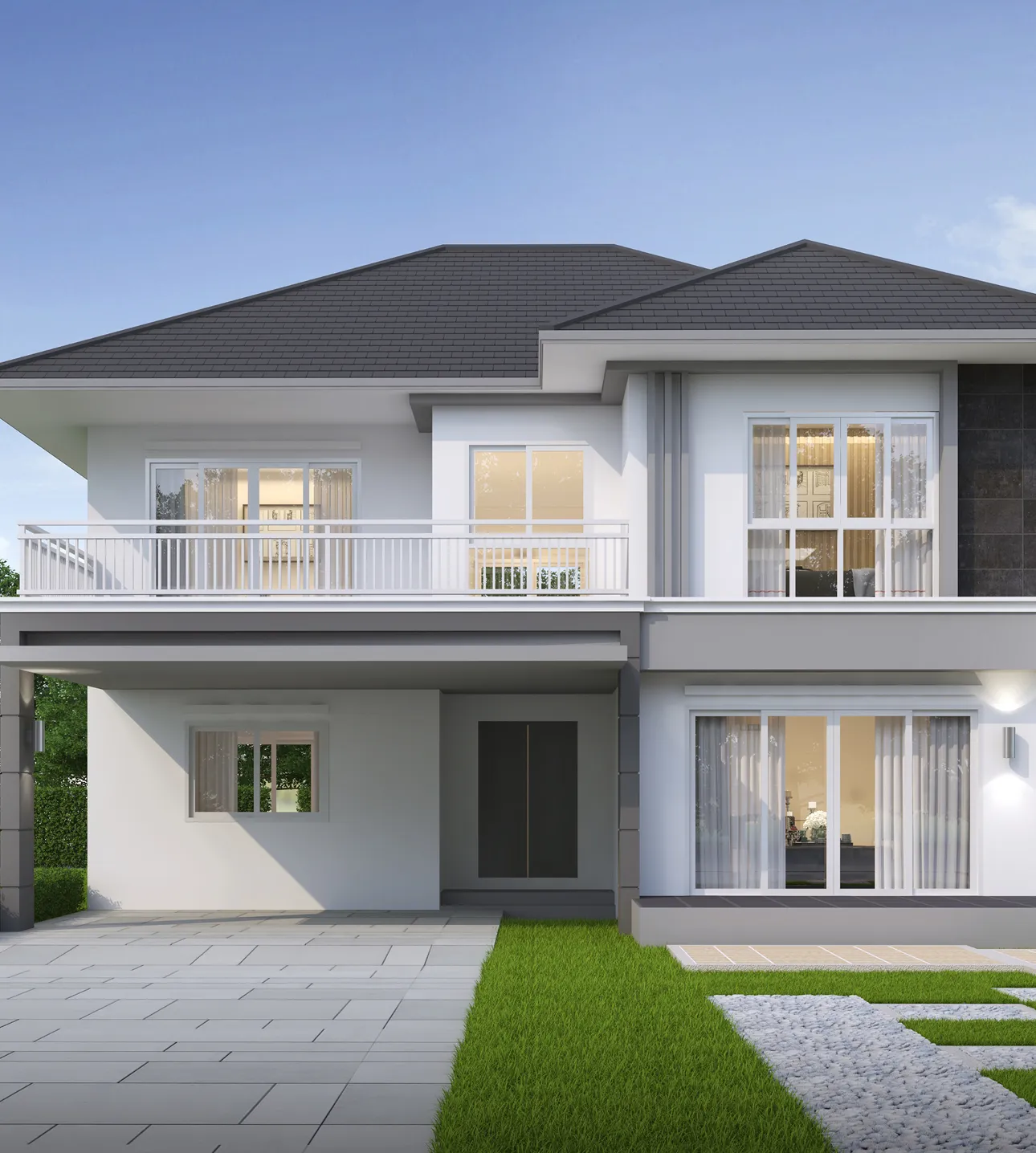 Modern two-story white house with dark gray roof, large windows, balcony, and driveway next to a green lawn.