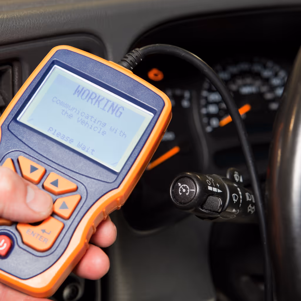 Checking for cleared fault codes during a used car inspection in Uxbridge. Maxamy Mobile Autocare uses OBD tools to ensure the "Check Engine" light hasn't been tampered with by the seller.