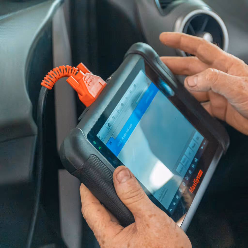 Graeme, Head Mechanic at Maxamy Mobile Autocare, using dealer-level MaxiSys diagnostic tools in Slough to read live engine data and interpret complex fault codes.