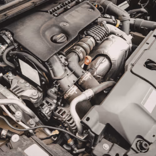 Car engine bay close-up used to represent exhaust fault diagnostics, emissions checks and performance-related exhaust issues in Maidenhead and nearby towns.
