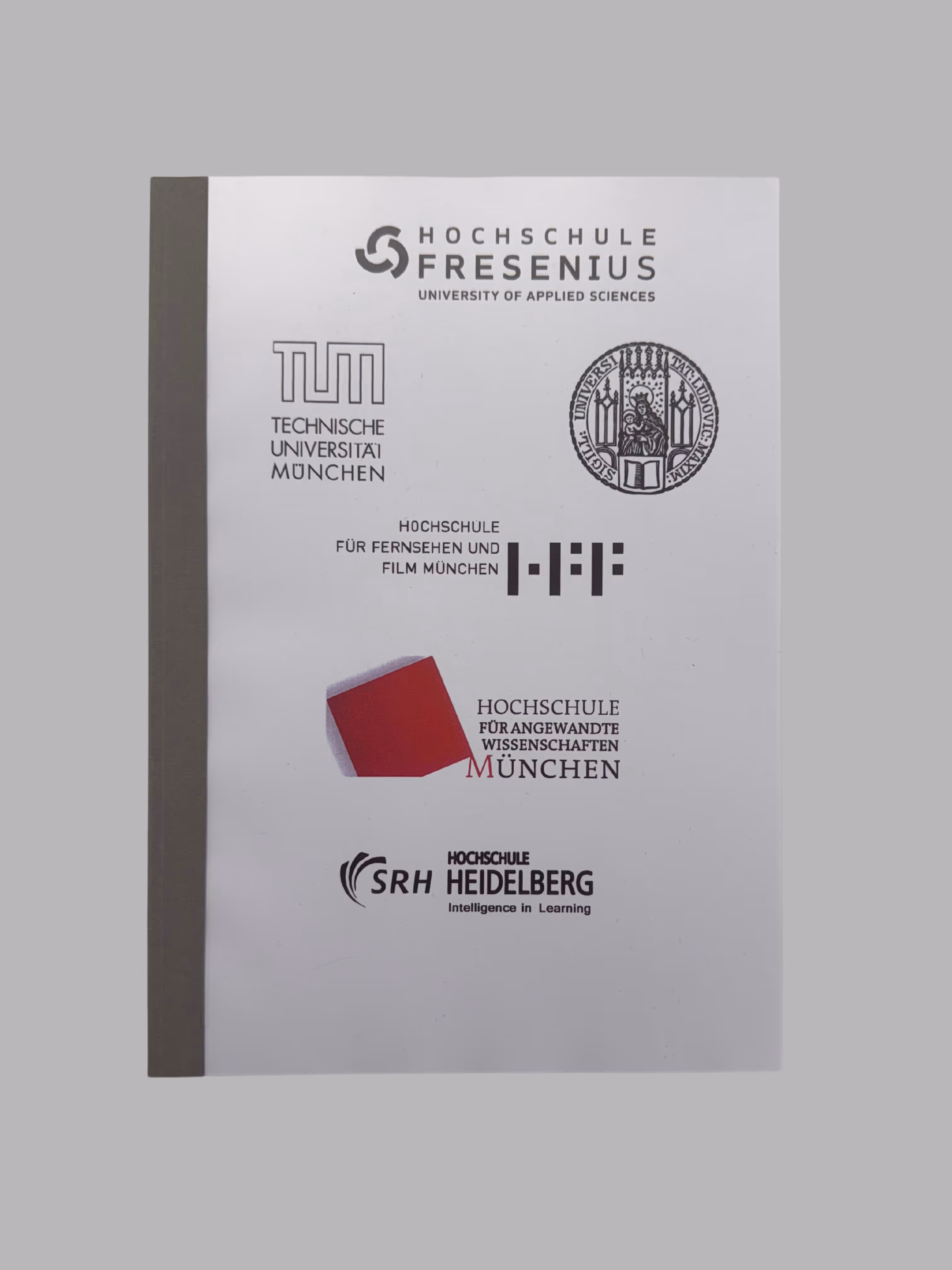 White booklet with logos and names of German universities and applied sciences including Hochschule Fresenius, Technische Universität München, Hochschule für Fernsehen und Film München, Hochschule München, and Hochschule SRH Heidelberg.
