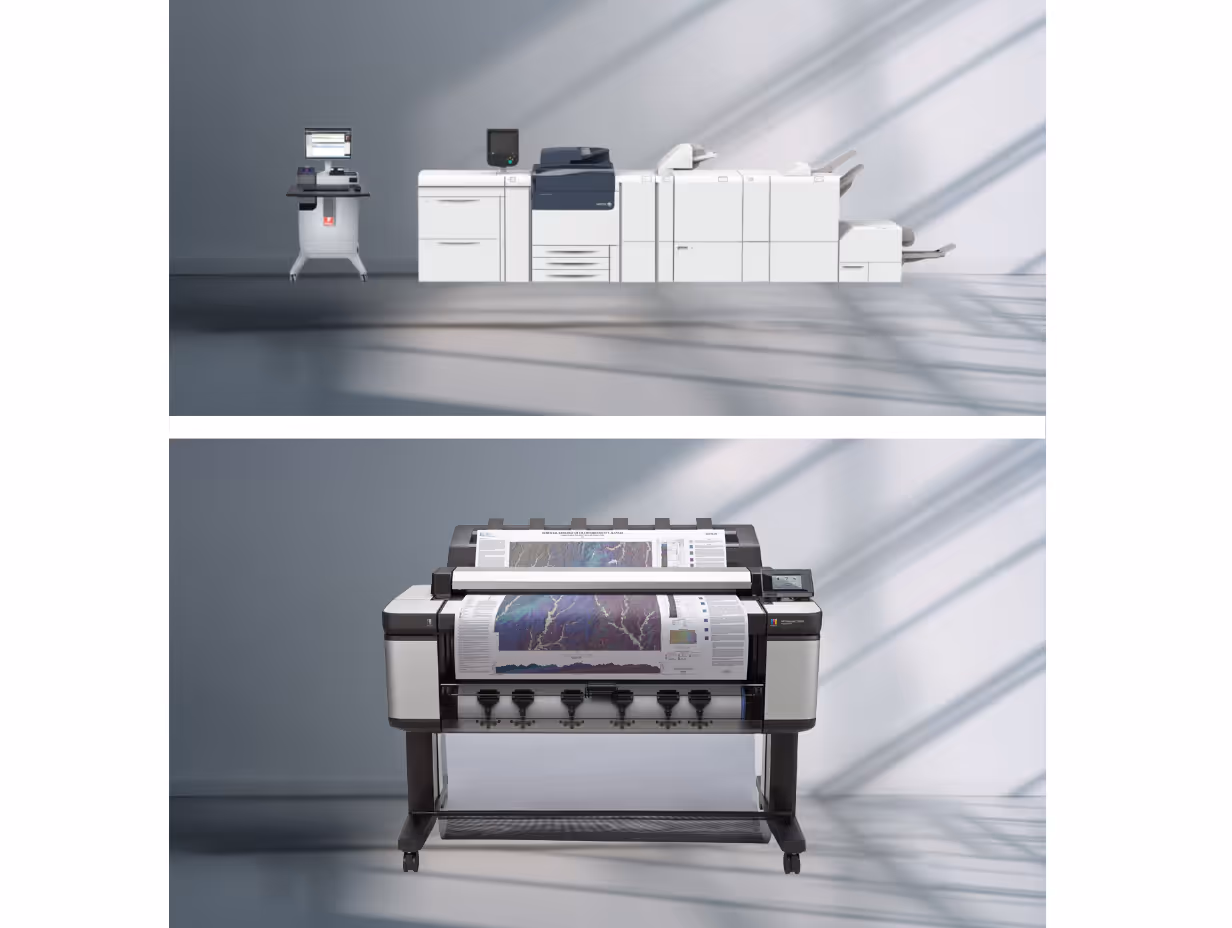 Two professional printing machines in a light-filled room, one wide-format printer printing a colorful map, and one multi-function copier with monitor.