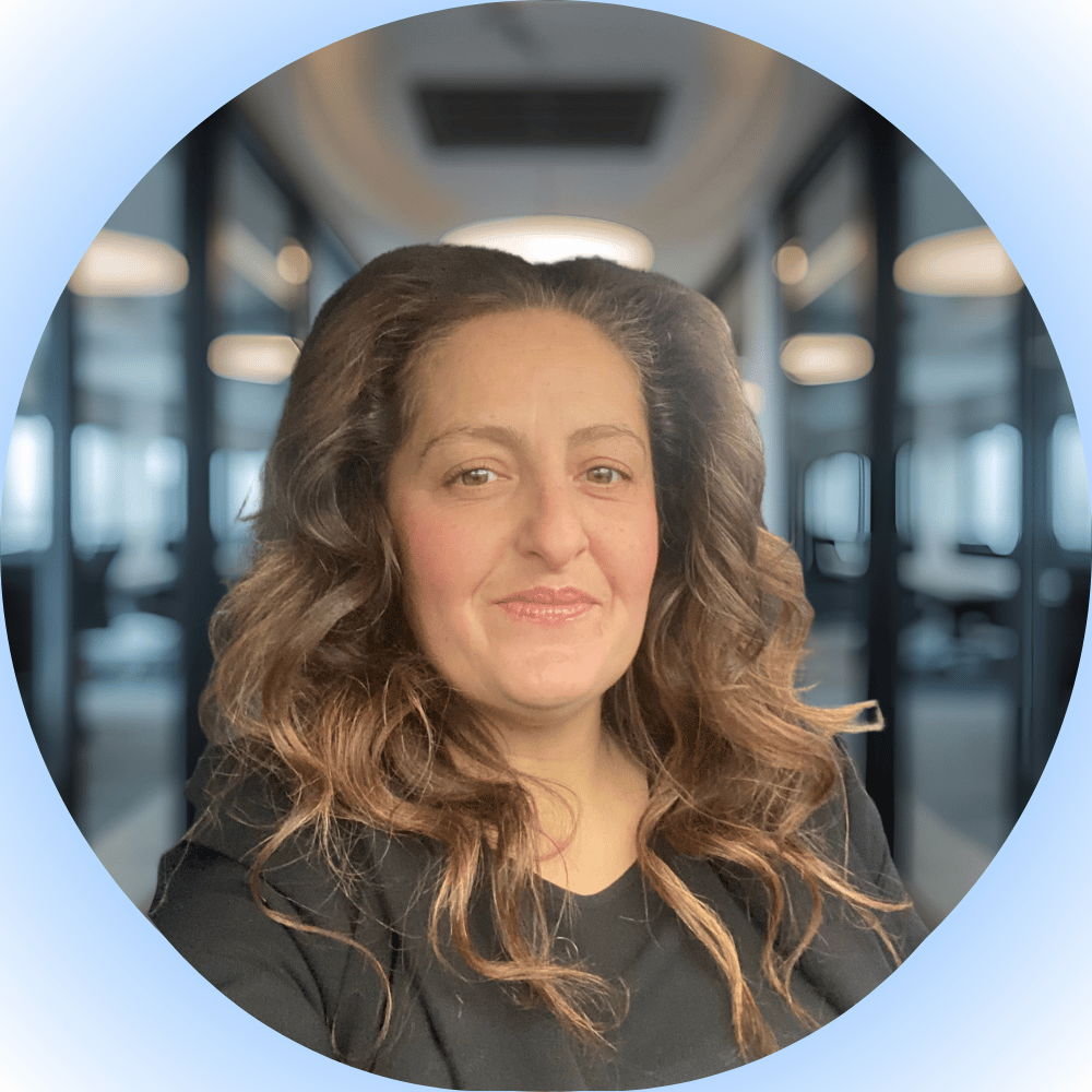 image of business professional reviewing analytics (for a hr tech), digital project on a laptop screen