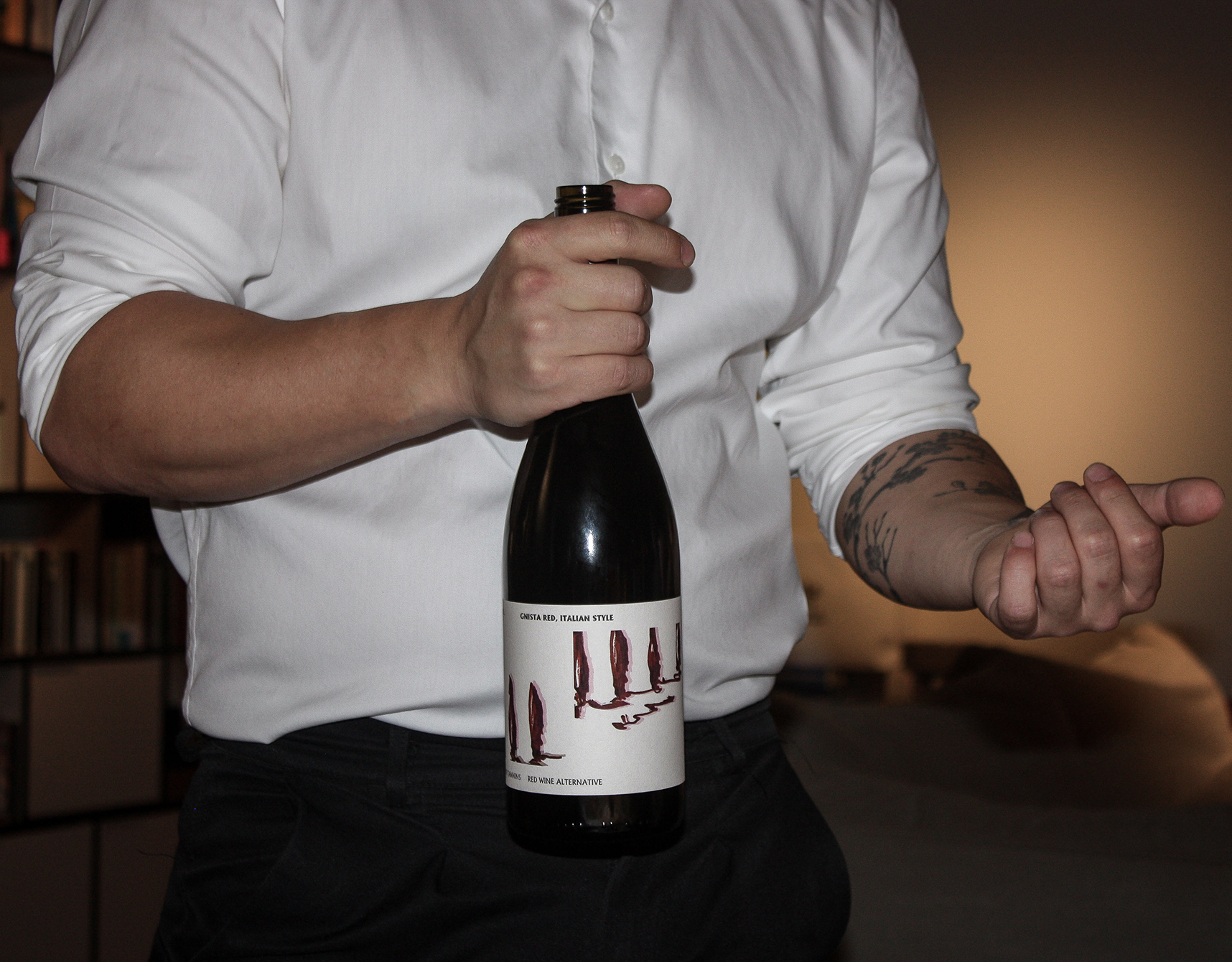 Sommelier holding a bottle of wine