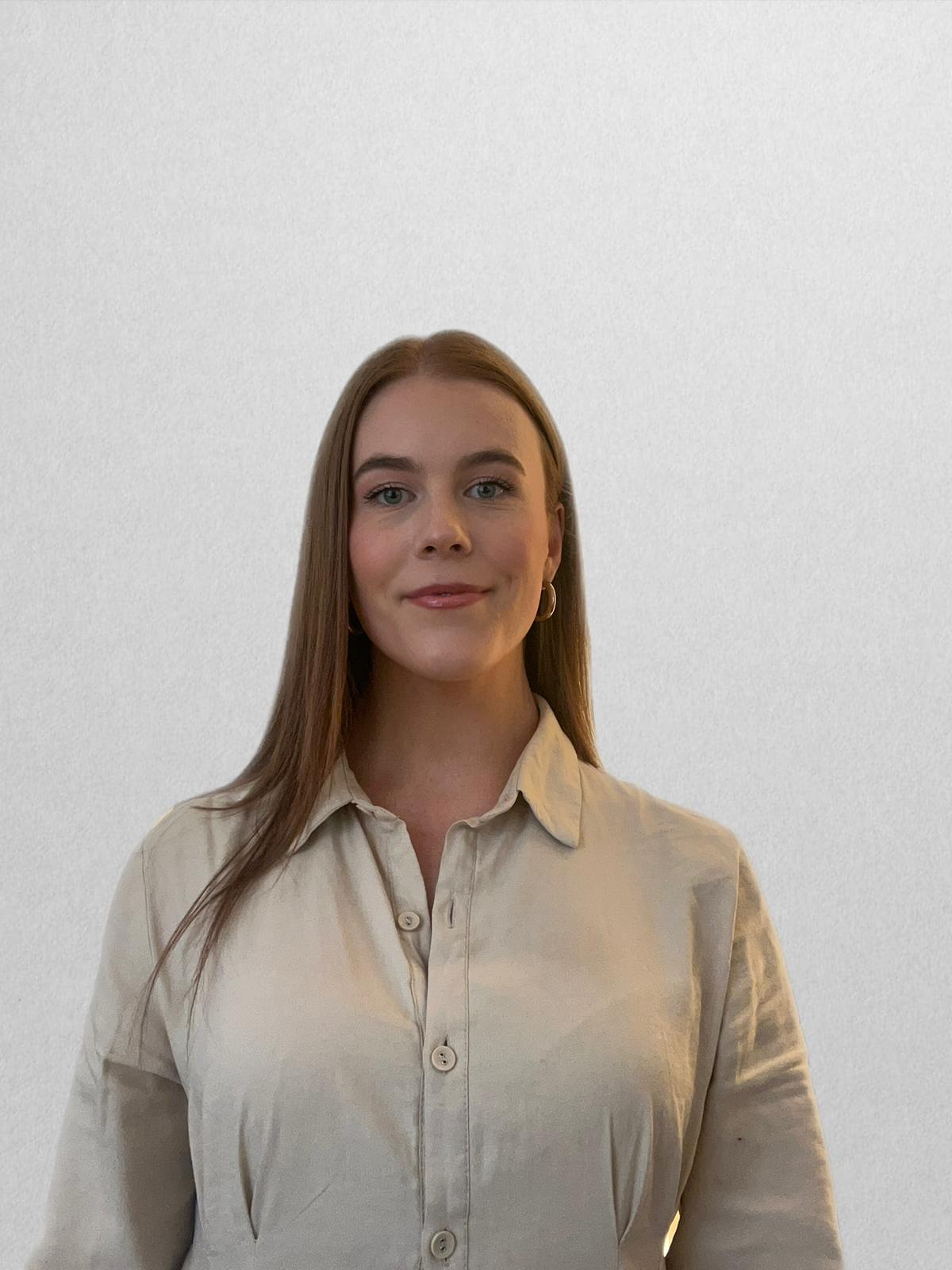 image of a personal trainer guiding a client through a workout