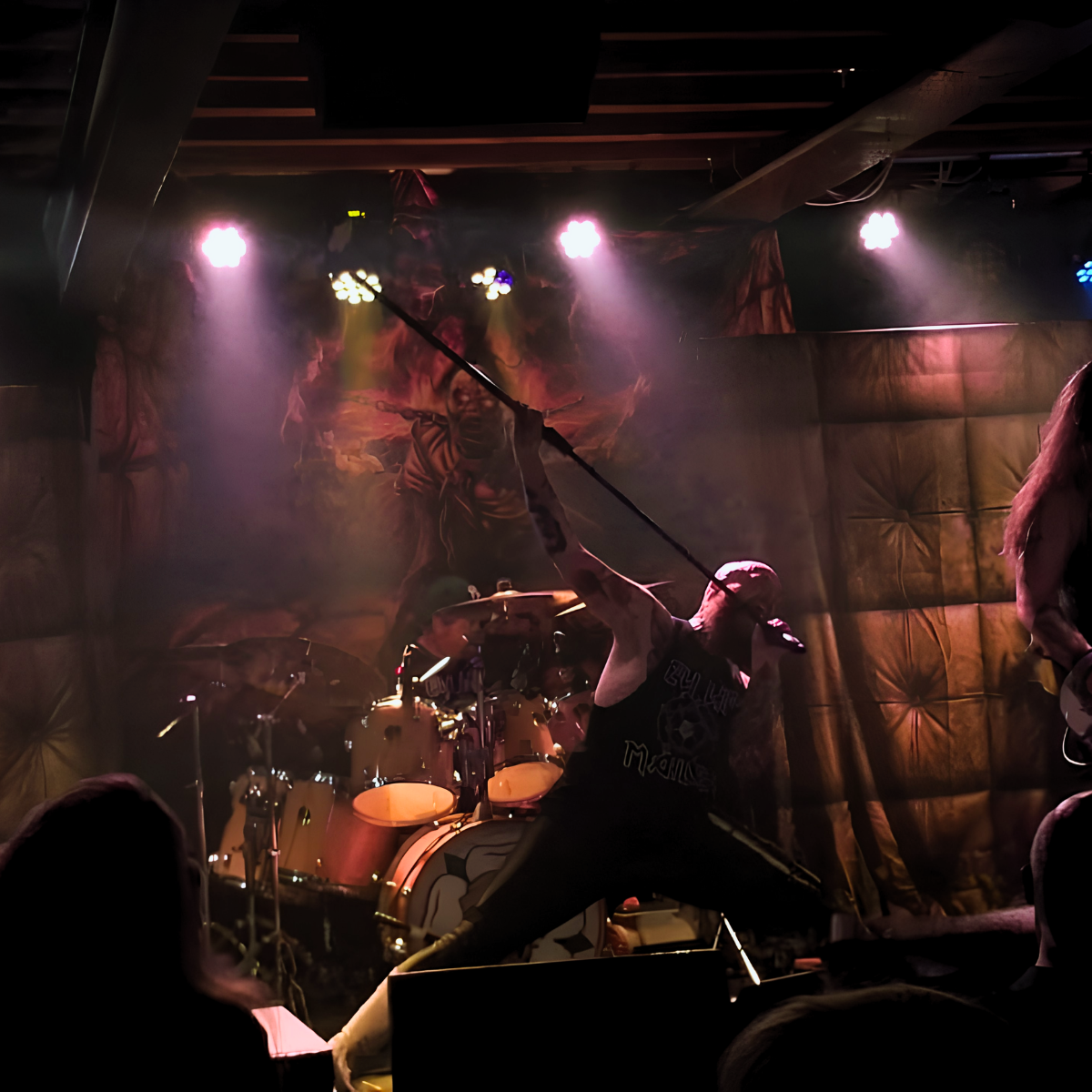 Jon Crowder on stage with Ey Up Maiden