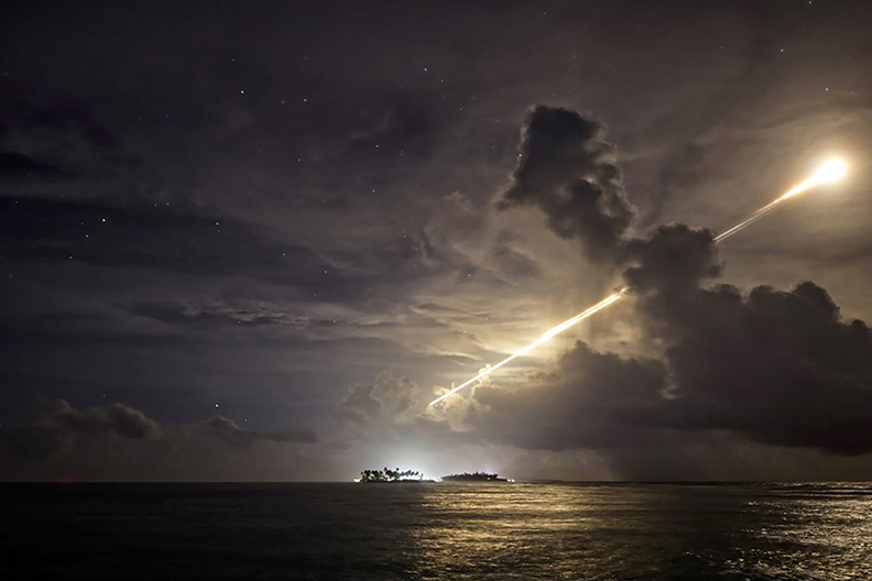 Missile defense test launch trajectory lighting up the night sky, representing the mission-critical applications of JGA's aerospace components