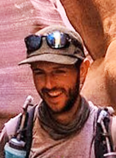 Photo de Matthieu Laurent (coach en course à pied, kiné et osteo du sport à Brison-Saint-Innocent) en plein trail 