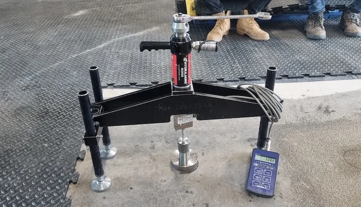 Screed adhesion pull off load testing.