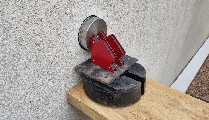 Adhesion test adaptor bonded in place for testing.