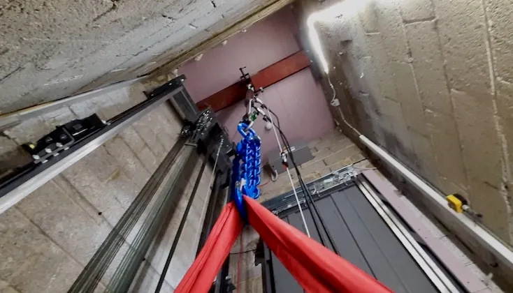 Beam at the top of a lift shaft load tested.