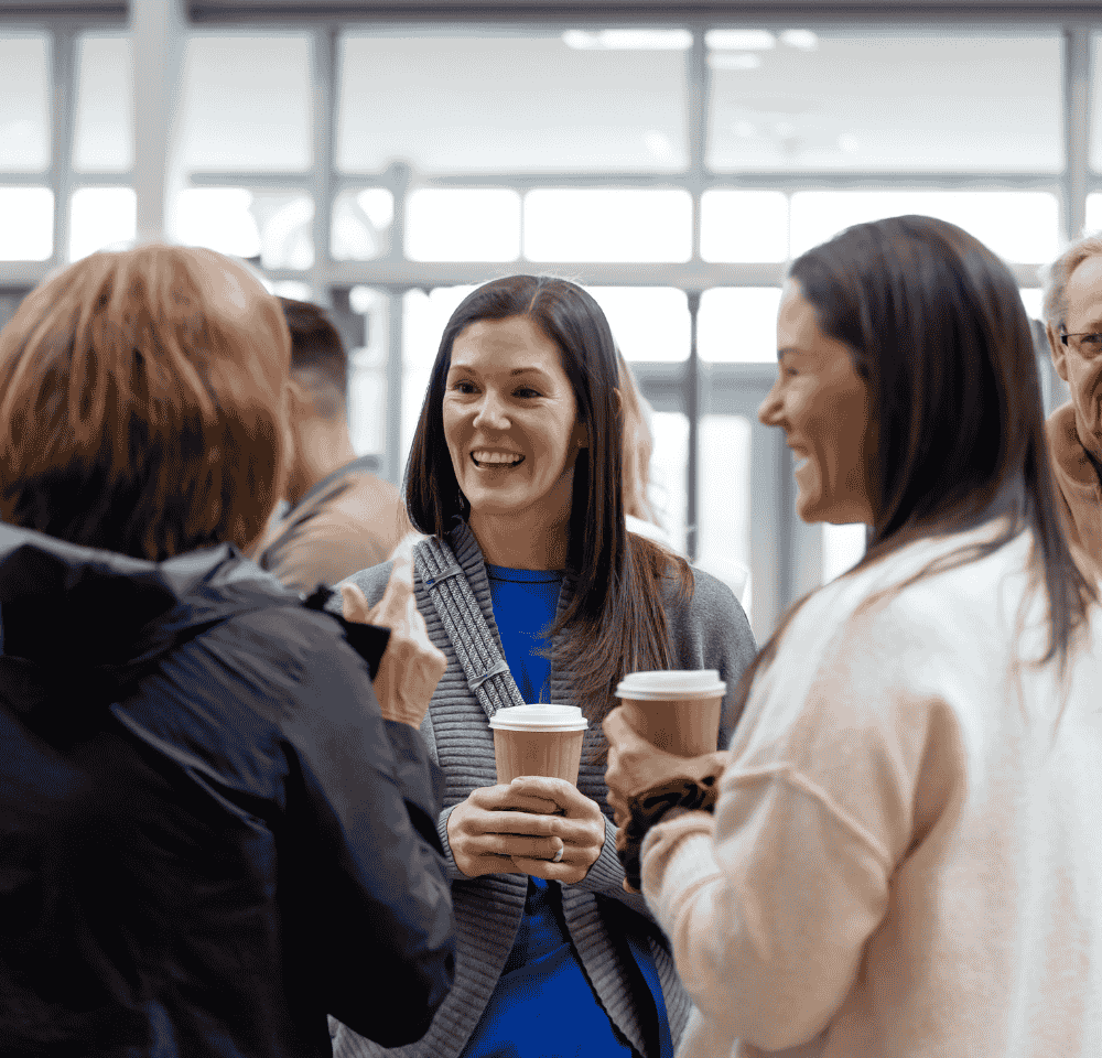 Life group of adults holding coffee