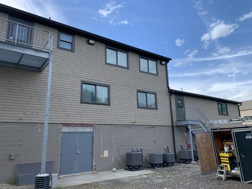 image of roofing contractor at work