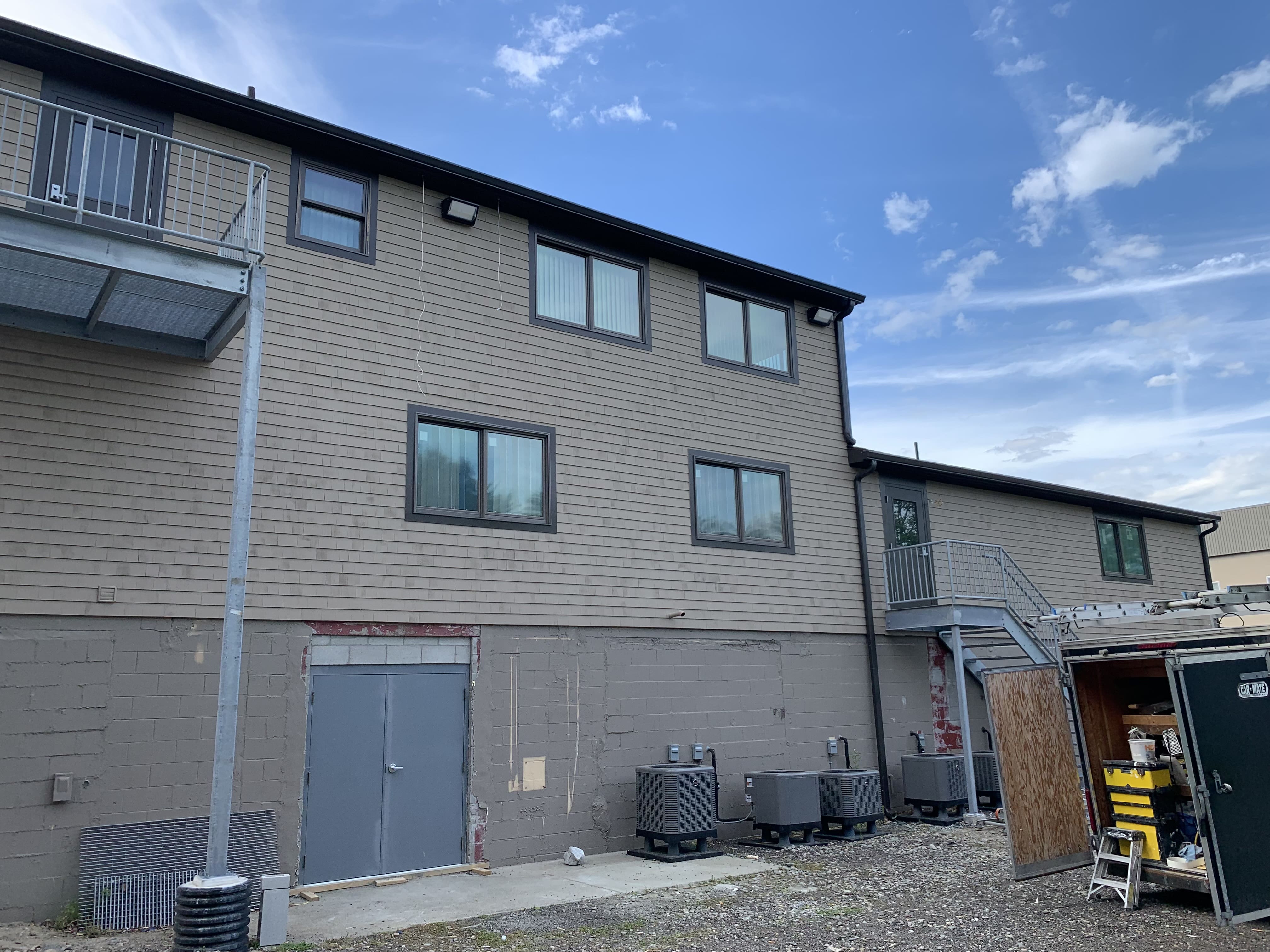 image of roofing contractor at work