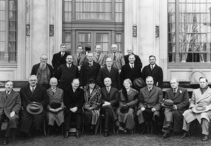 A historical picture containing some of the founding members of ACER, in black and white