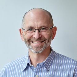 Headshot of Alisdair Daws