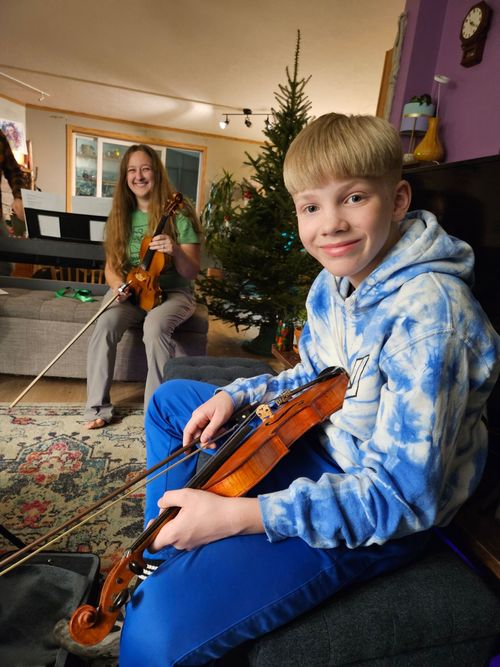 Katie McCoy playing fiddle at Maple & Spruce