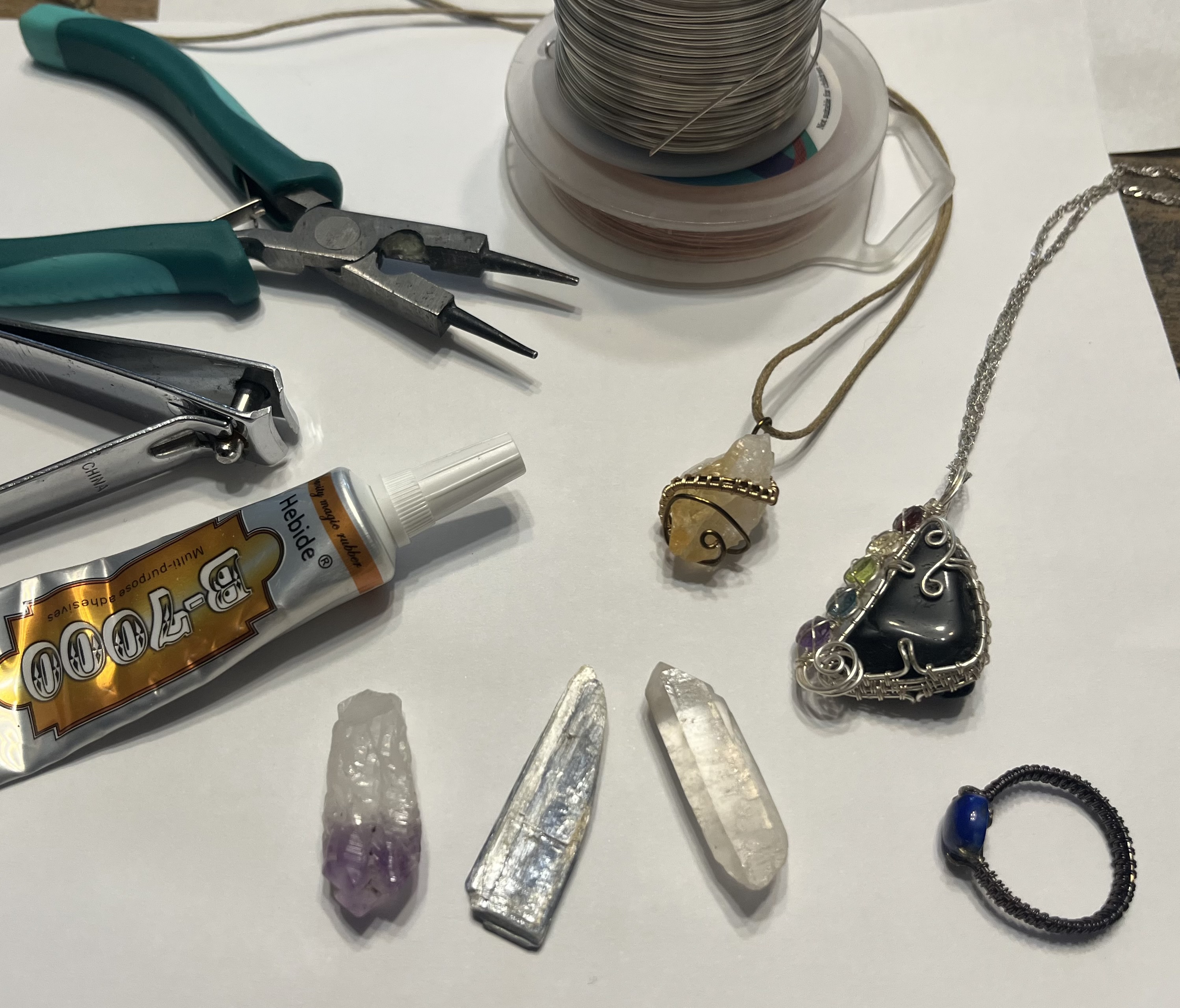 Colorful stained glass pieces drying after a workshop