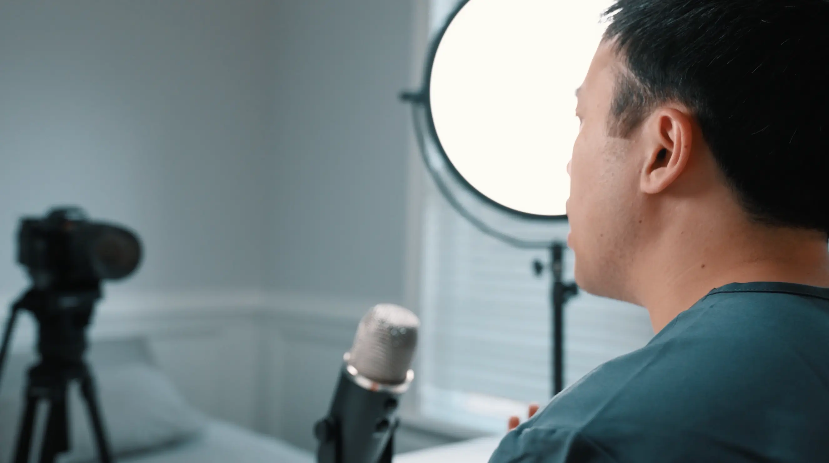 Dr. Jeffrey Tran recording patient education content for YouTube and TikTok — founder of Stratus Eye in Suwanee, GA