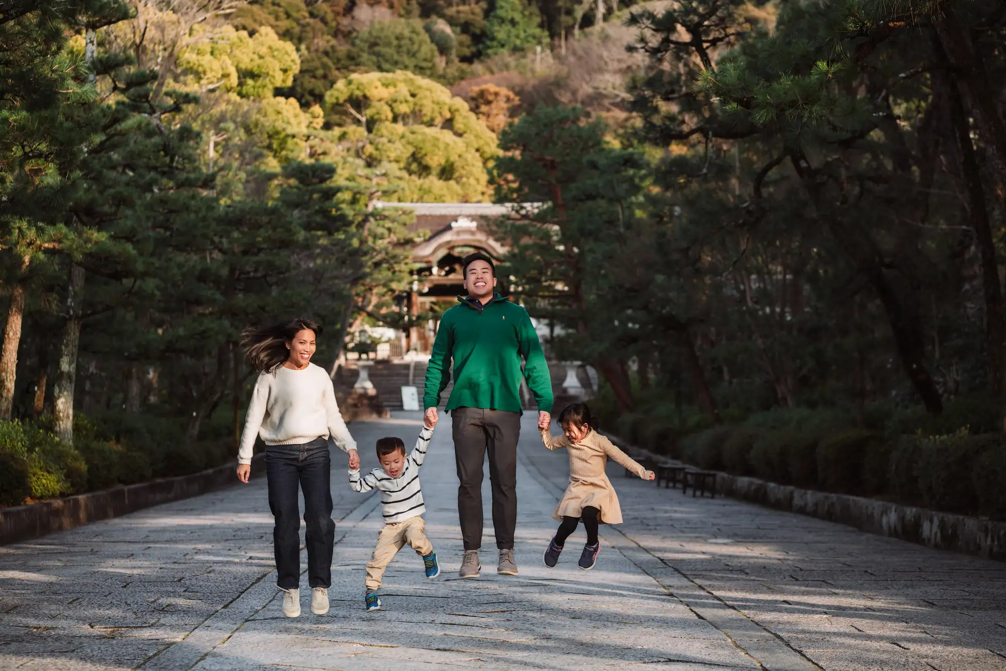 Dr. Jeffrey Tran with his family in Japan — founder of Stratus Eye in Suwanee, GA