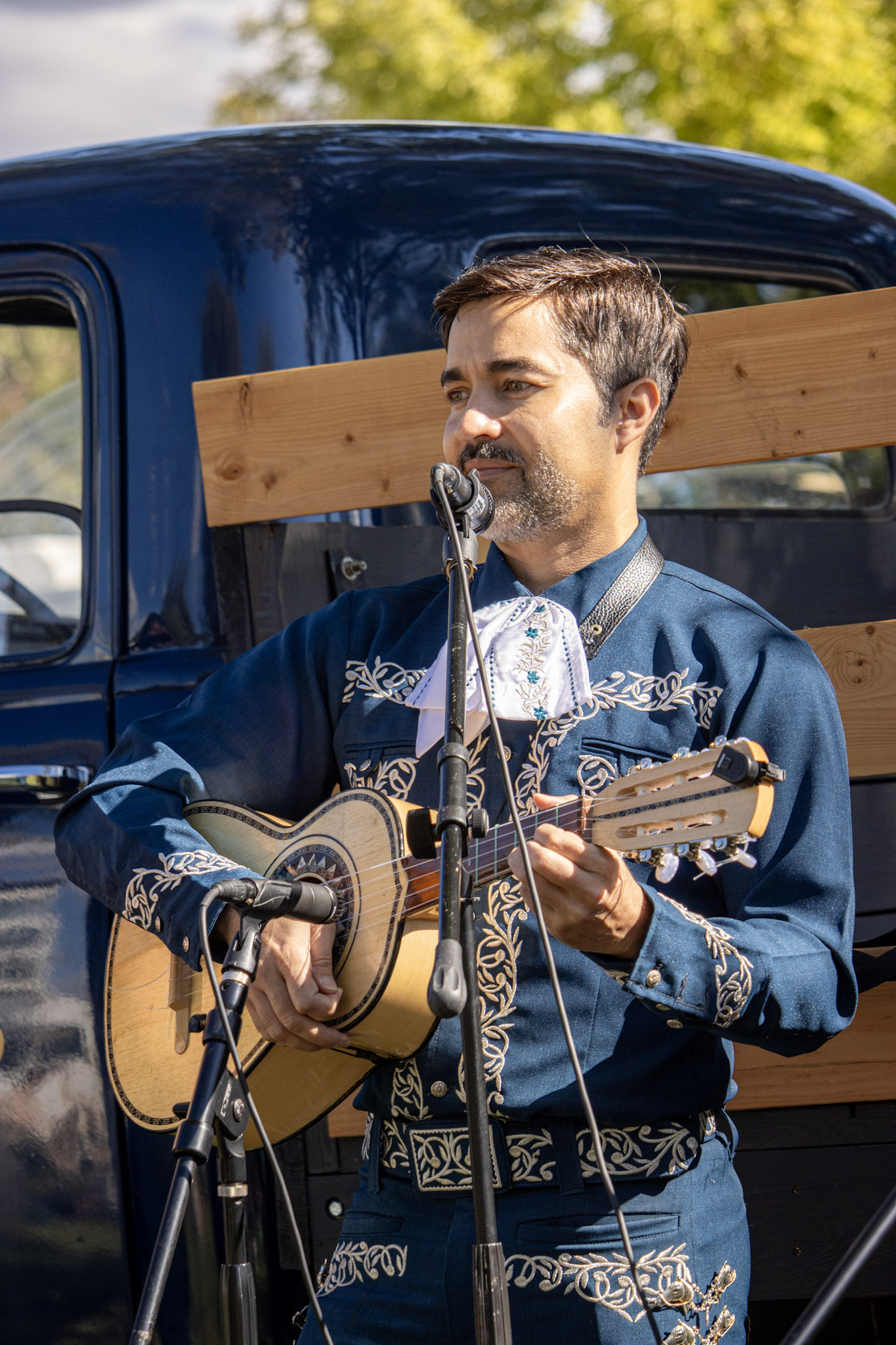 Arturo Fuentes vihuela player with Karlysue y Los Charros Utah mariachi band
