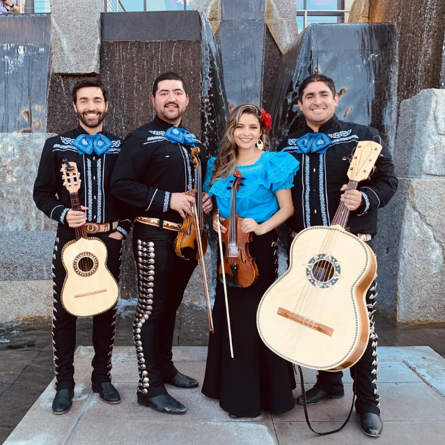 Mariachi band performing at a public outdoor event in utah