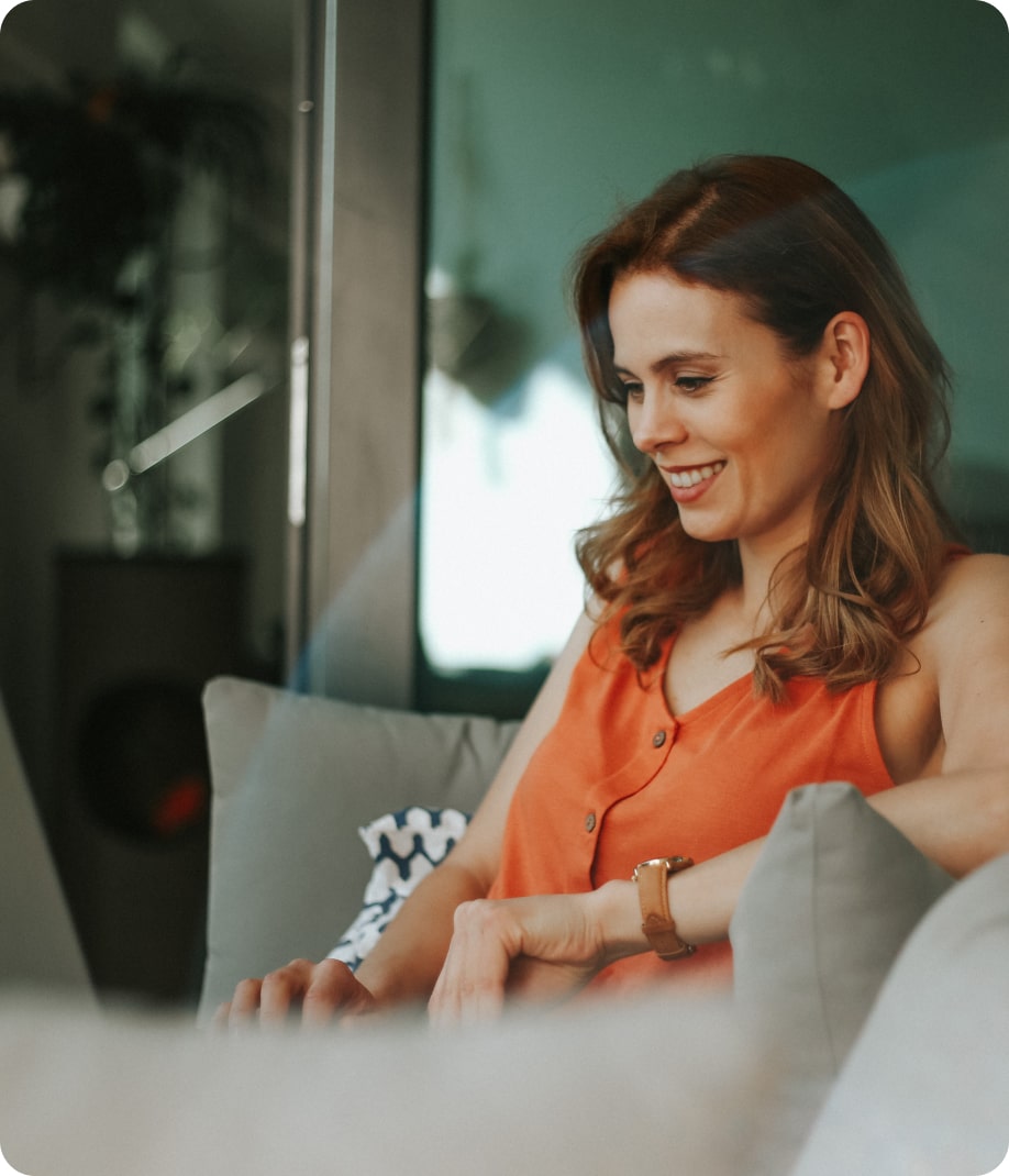 Woman looking at laptop