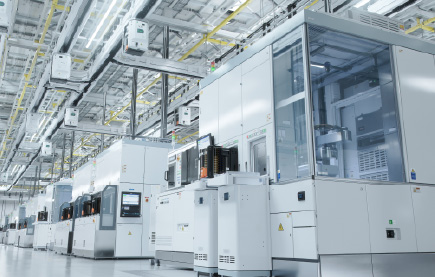 Close-up of two steel injection molds with detailed star-shaped cavity patterns on each plate.