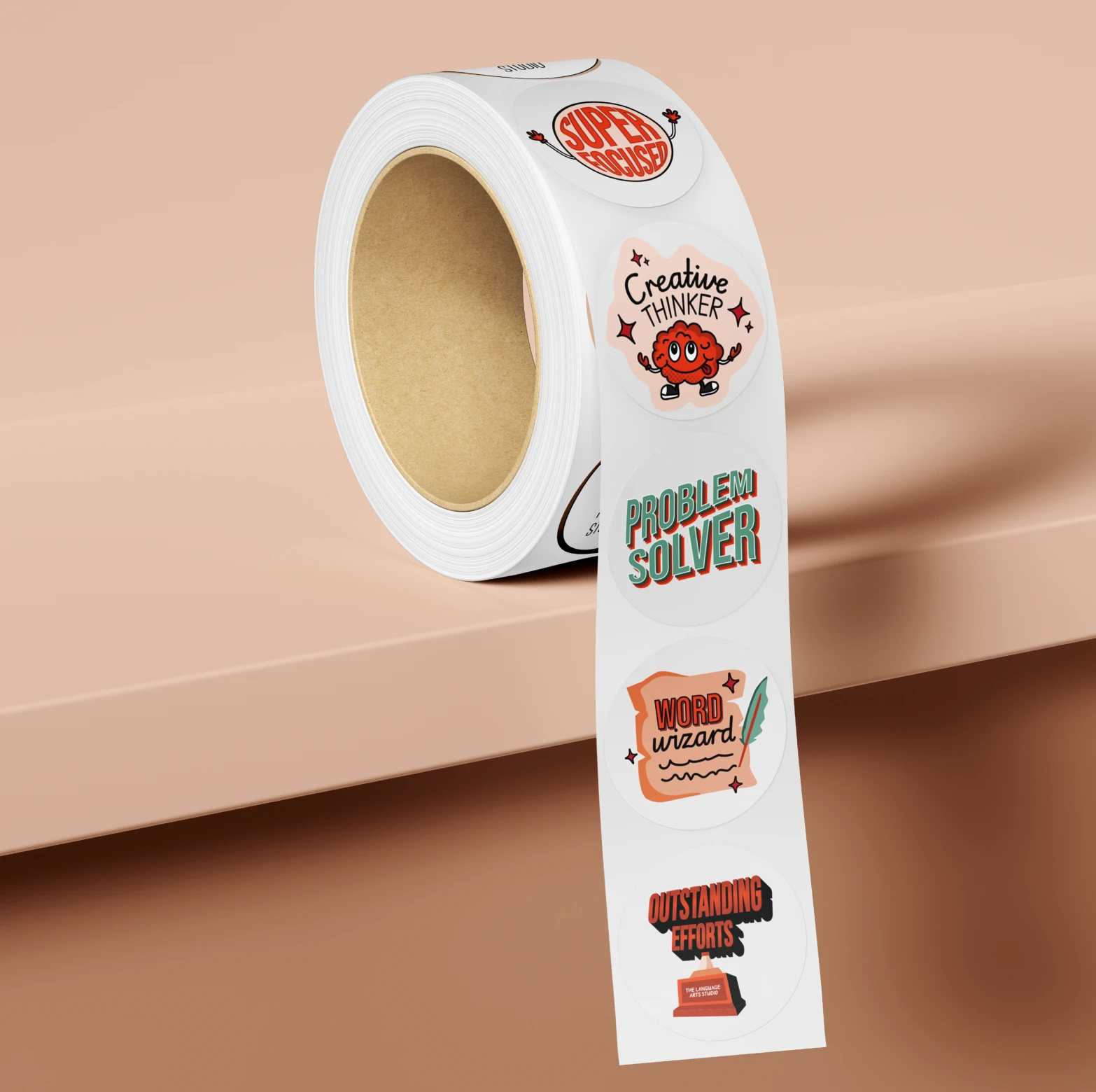 Roll of stickers with phrases: Super Focused, Creative Thinker with a cartoon brain, Problem Solver, Word Wizard with a quill, and Outstanding Efforts with a trophy.