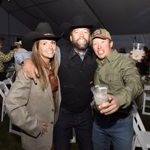 A group of people standing next to each other.