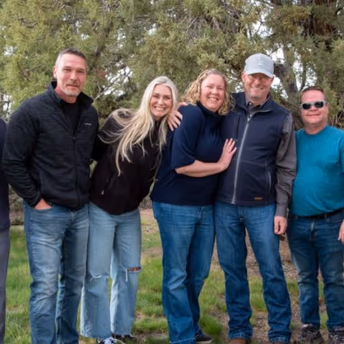 A group of people standing next to each other.