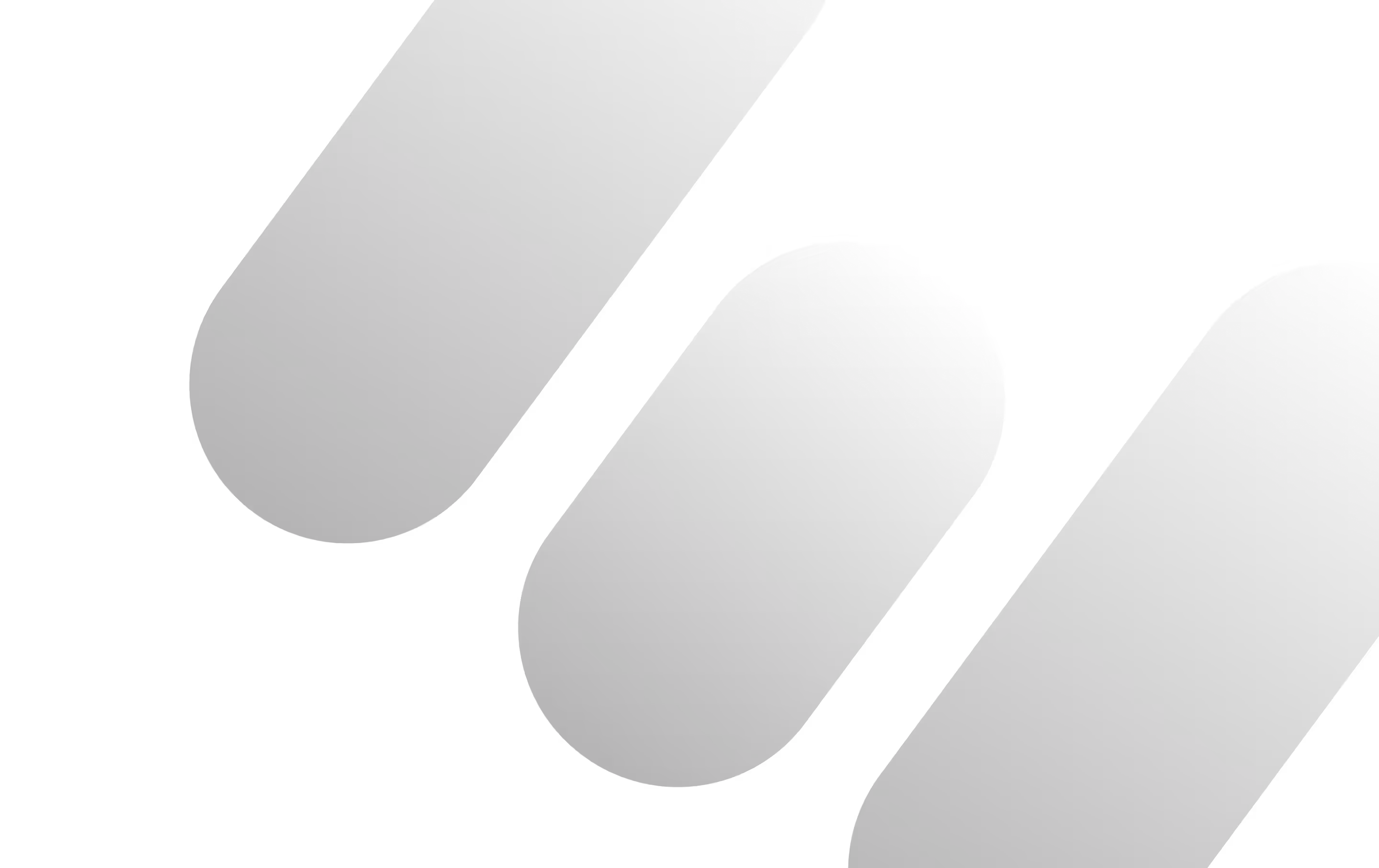 Black capsules or pills scattered on a black background.