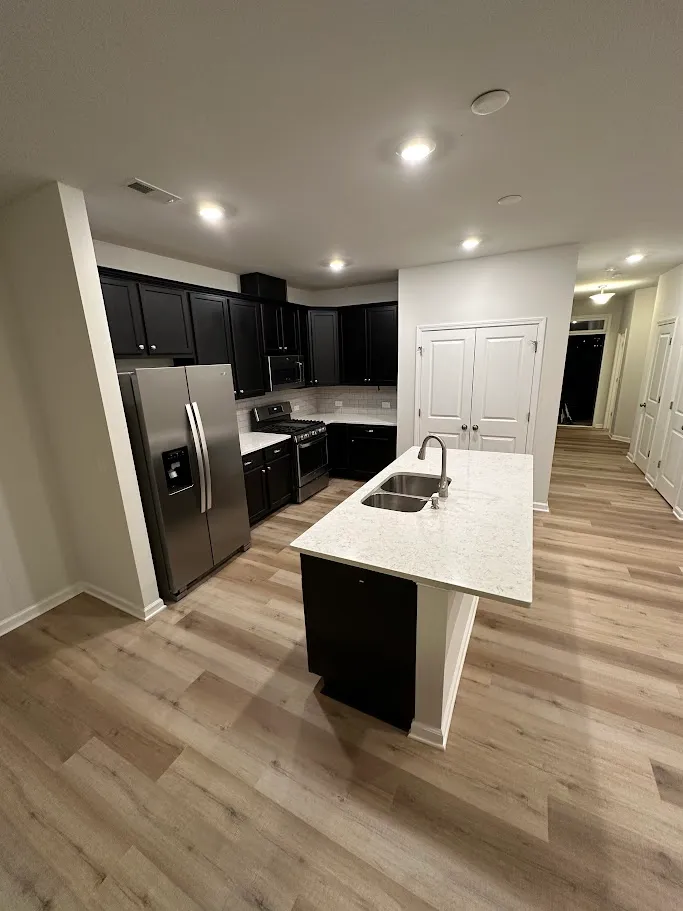 A kitchen that has had new flooring installed