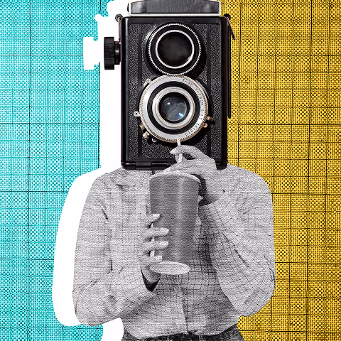 Illustration of a person with a vintage camera as a head, drinking from a cup with a straw against a blue and yellow grid background.