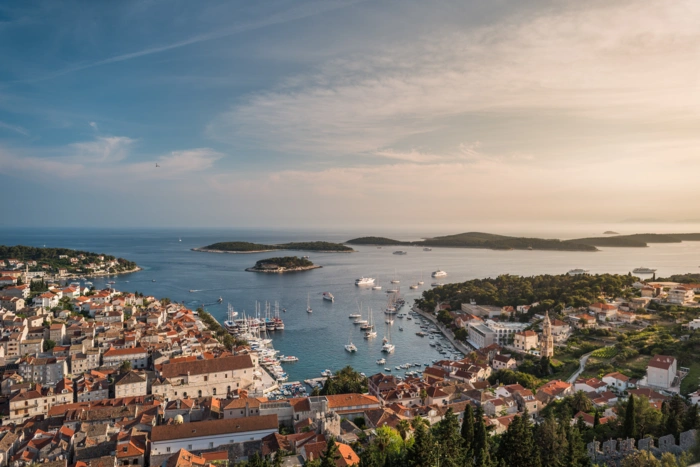 Harbour town and offshore islands seen from a hilltop
