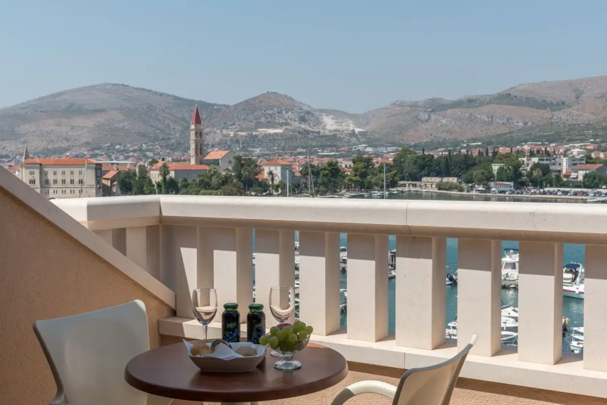 Trogir Palace balcony overlooking the town and mountains