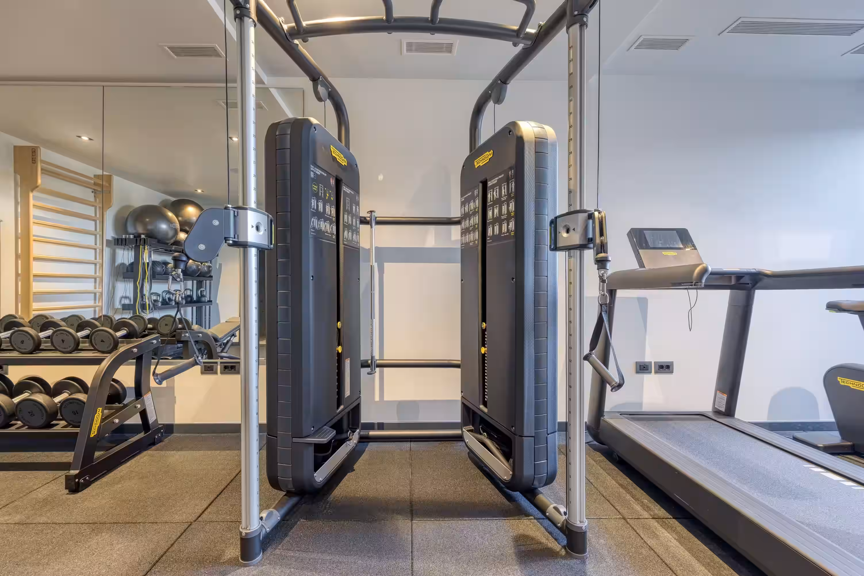 Level 5 Rovinj gym with cable machine and treadmill